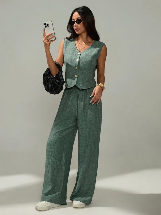 Women's elegant two-piece set - sleeveless top and wide-leg pants with button details