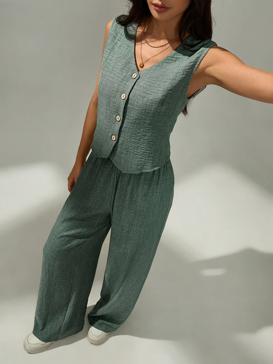 Women's elegant two-piece set - sleeveless top and wide-leg pants with button details