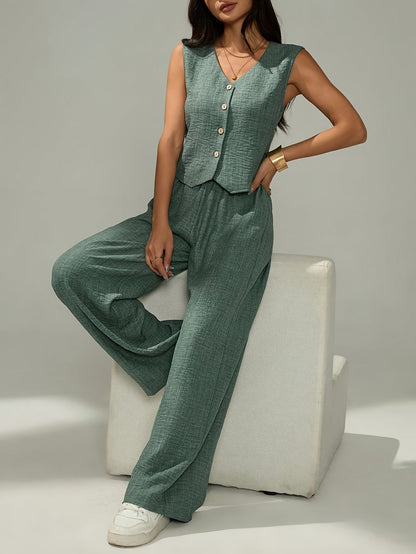 Women's elegant two-piece set - sleeveless top and wide-leg pants with button details