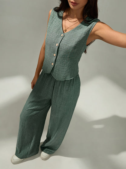 Women's elegant two-piece set - sleeveless top and wide-leg pants with button details